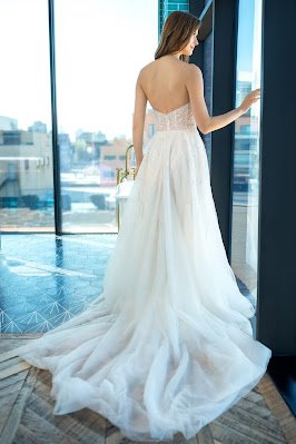Enaura Bridal Strapless a-line Bridal Dress with beaded throughout Back Design
